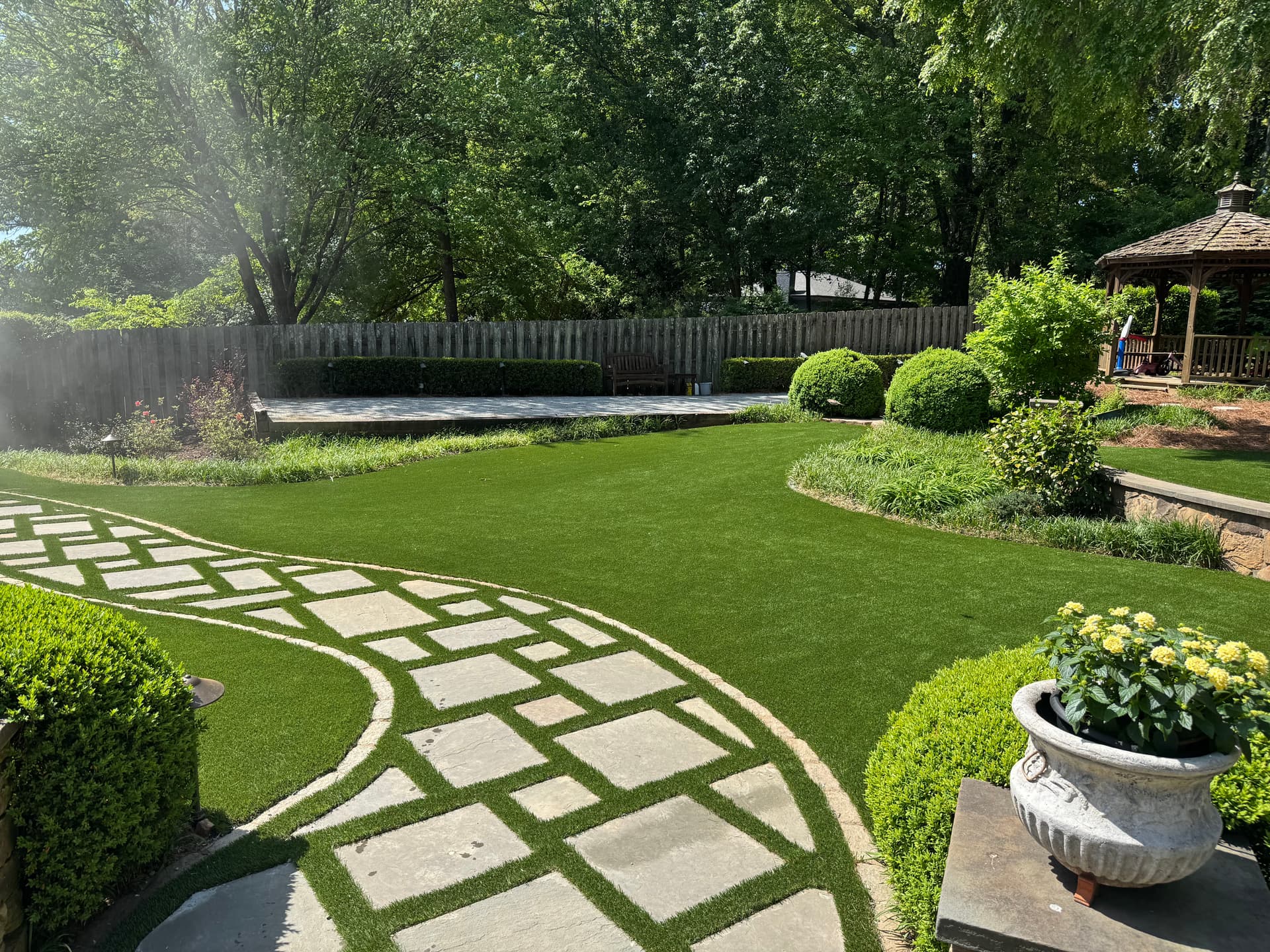 Backyard Turf Installation with Stone Path in Dunwoody image