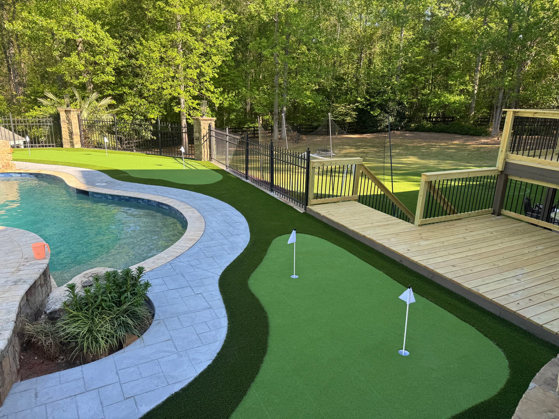 Gallery photos for Backyard Putting Green Installation Next to Pool in Kennesaw: Image #2
