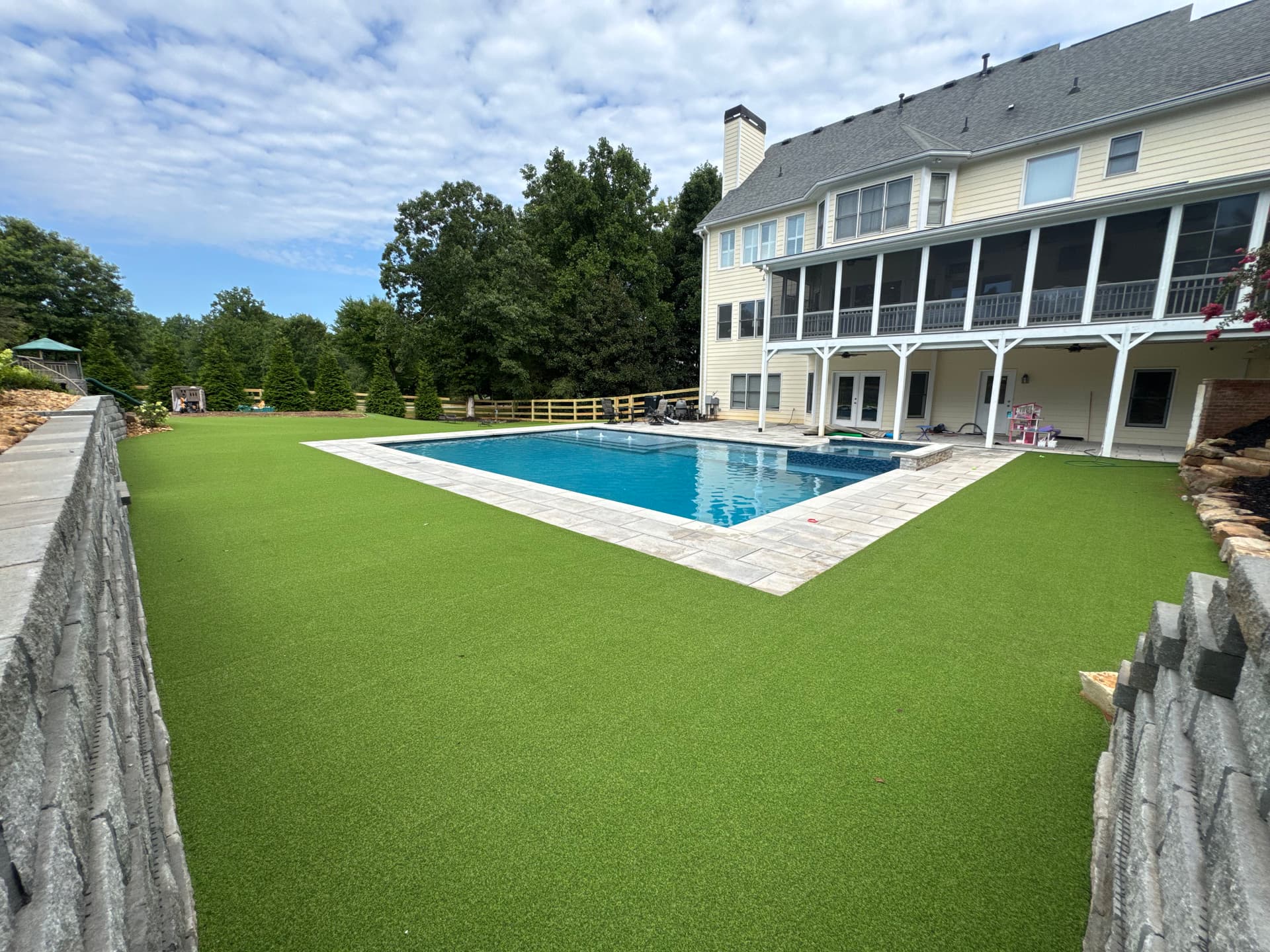 Poolside Artificial Turf and Putting Green Done Right image