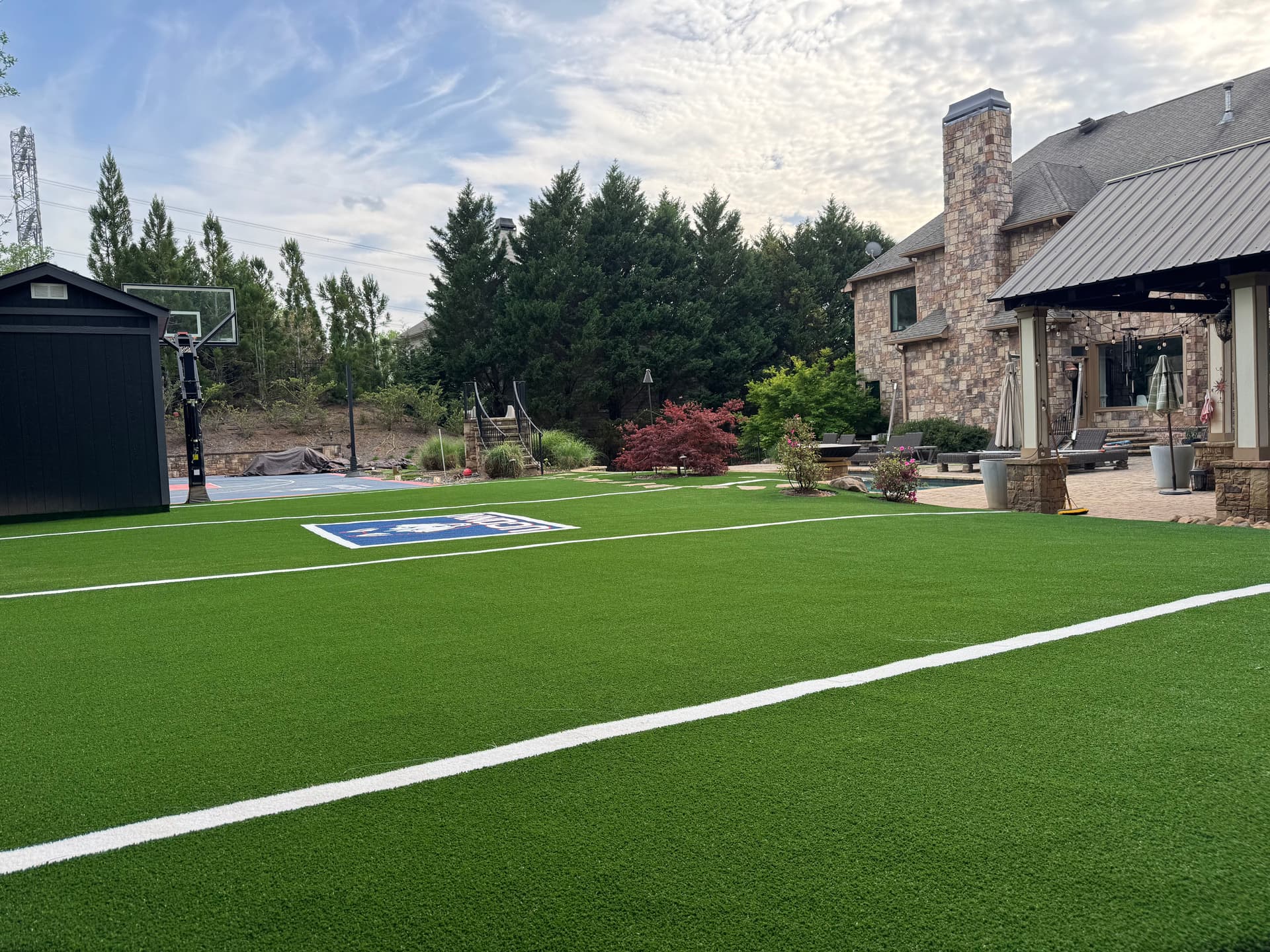 Gallery photos for Backyard Mini Football Field with Custom UConn Logo Turf: Image #2