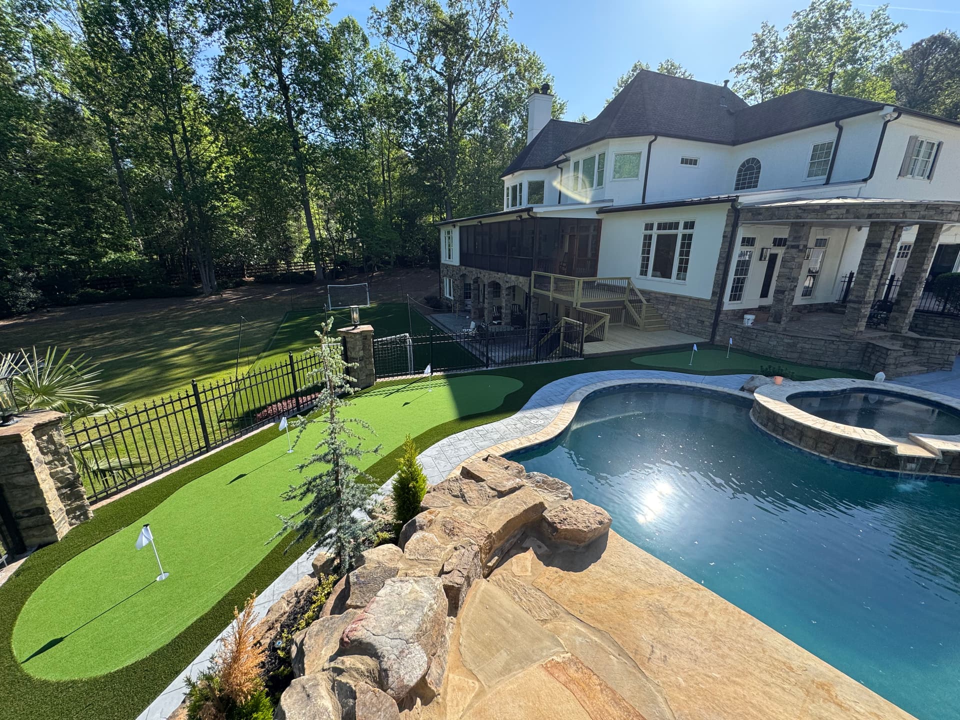 Gallery photos for Backyard Putting Green Installation Next to Pool in Kennesaw: Image #1