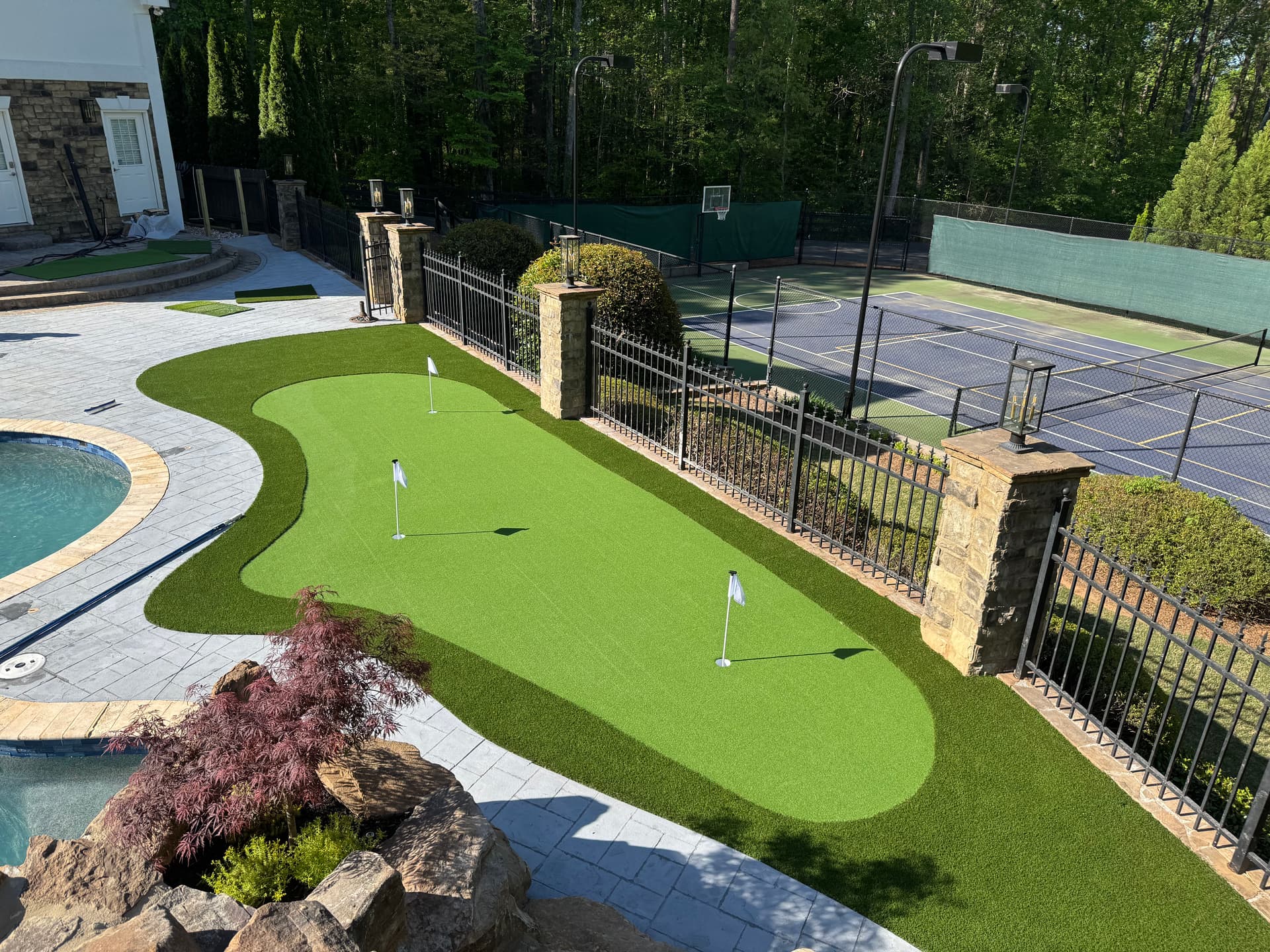 Gallery photos for Backyard Putting Green Installation Next to Pool in Kennesaw: Image #3