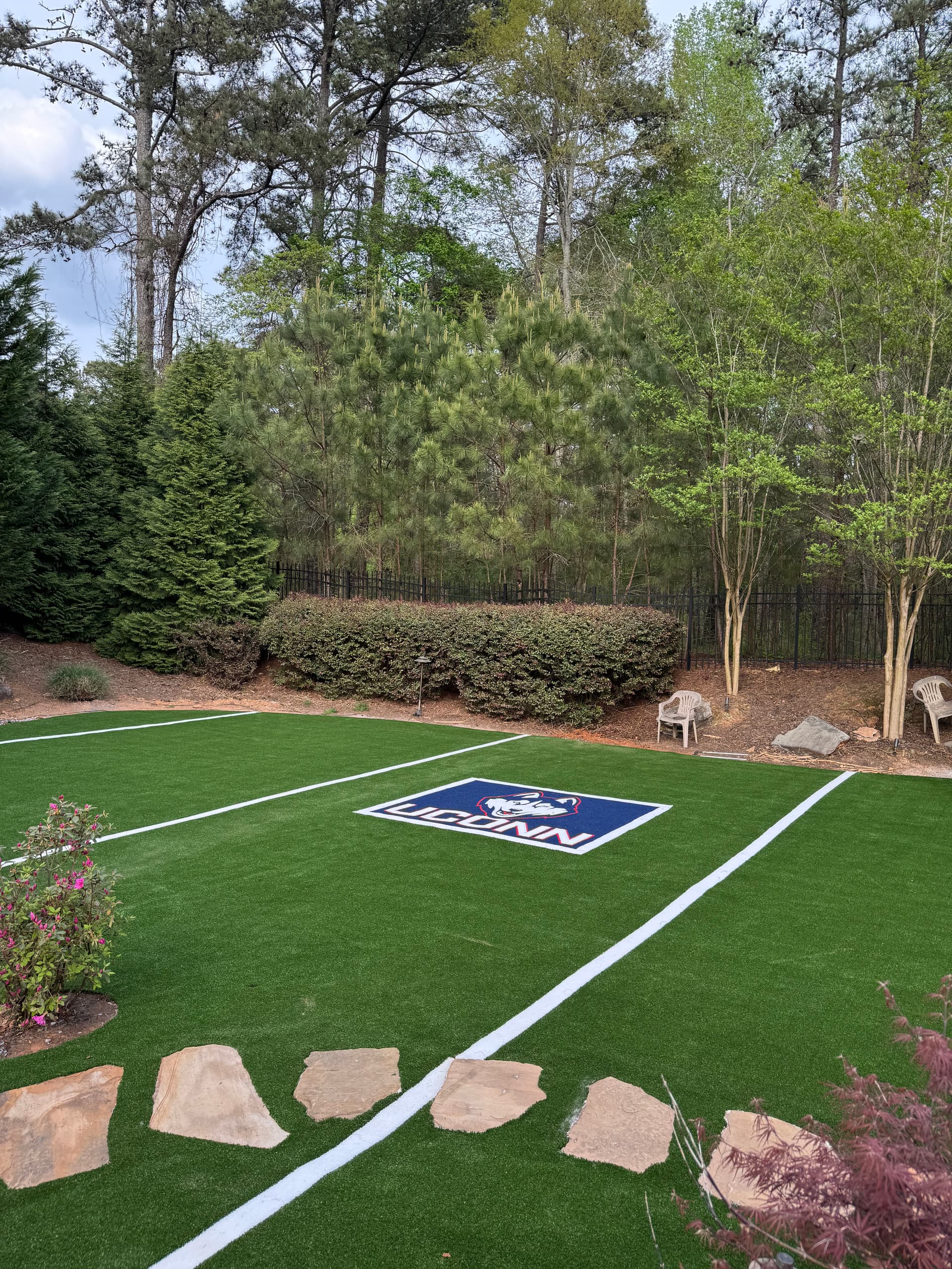 Gallery photos for Backyard Mini Football Field with Custom UConn Logo Turf: Image #1