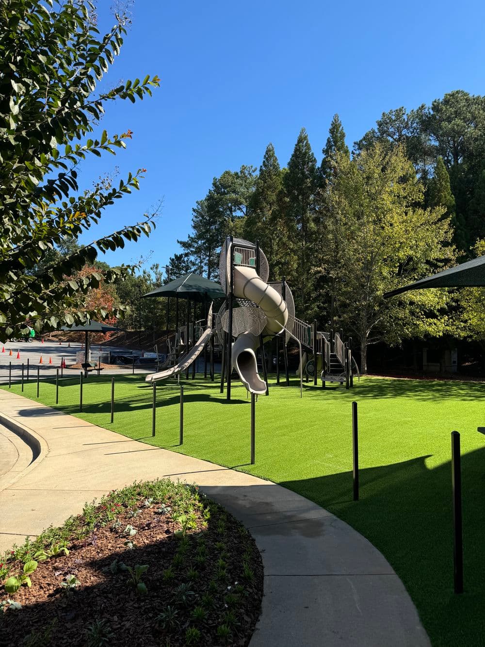 Perfectly manicured lawn with synthetic grass installation