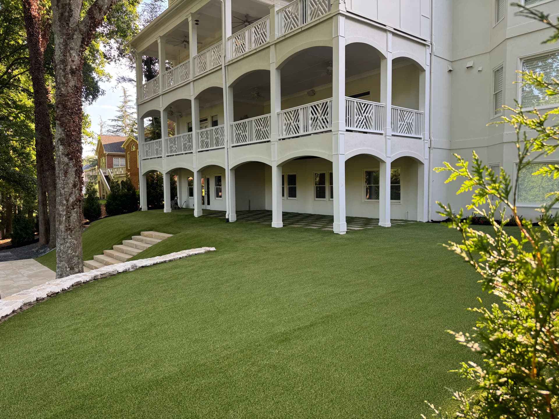 Steep Sloped Backyard Turned Into a Clean Usable Outdoor Space image