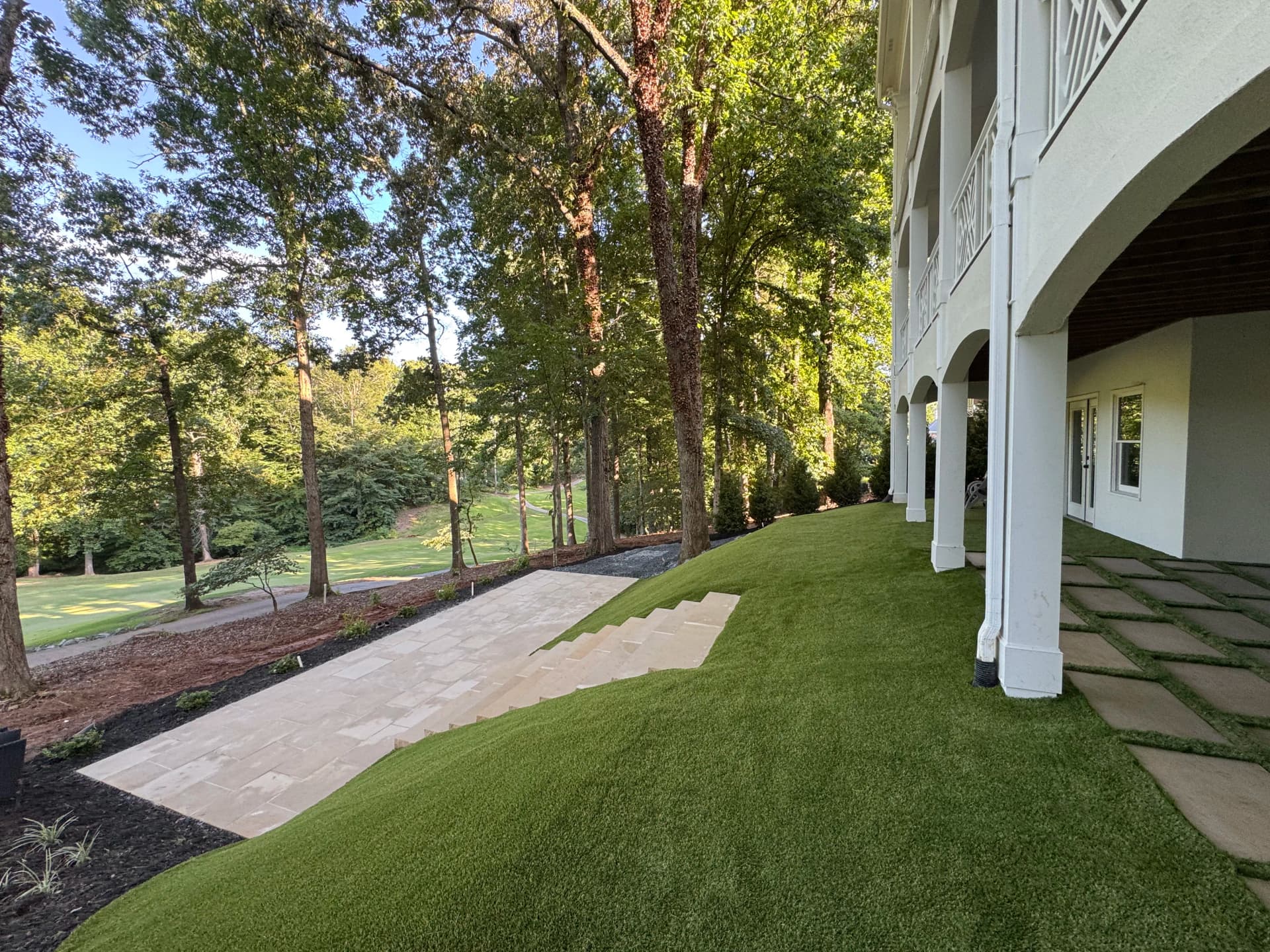 Gallery photos for Steep Sloped Backyard Turned Into a Clean Usable Outdoor Space: Image #1