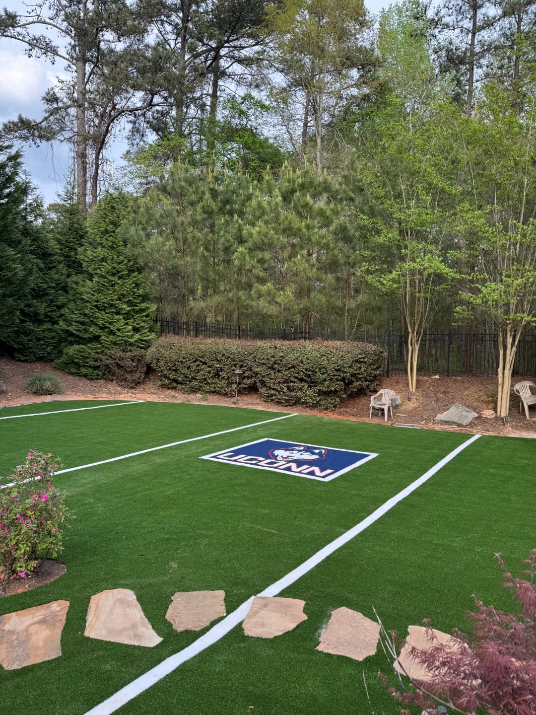 Mini Football Turf Backyard Mini Football Field with Custom UConn Logo Turf | Lazy Grass LLC